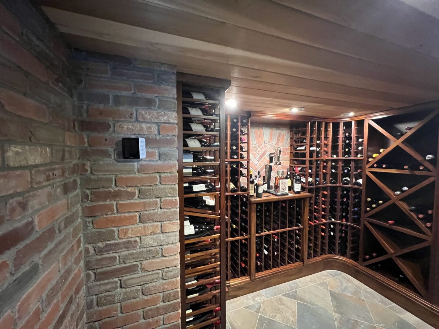 A room with many wine bottles in it